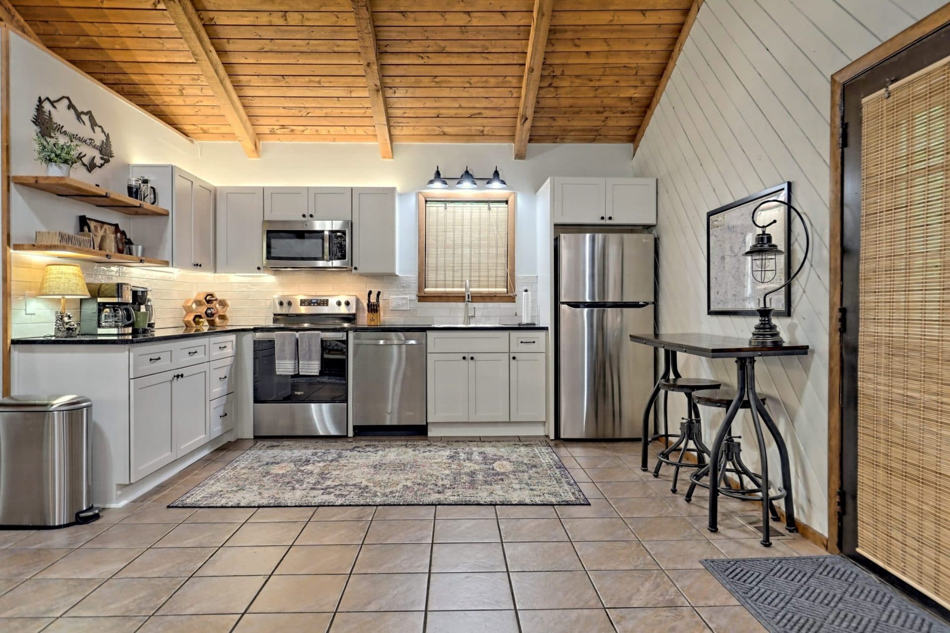 Full kitchen remodel featuring white shaker cabinet design